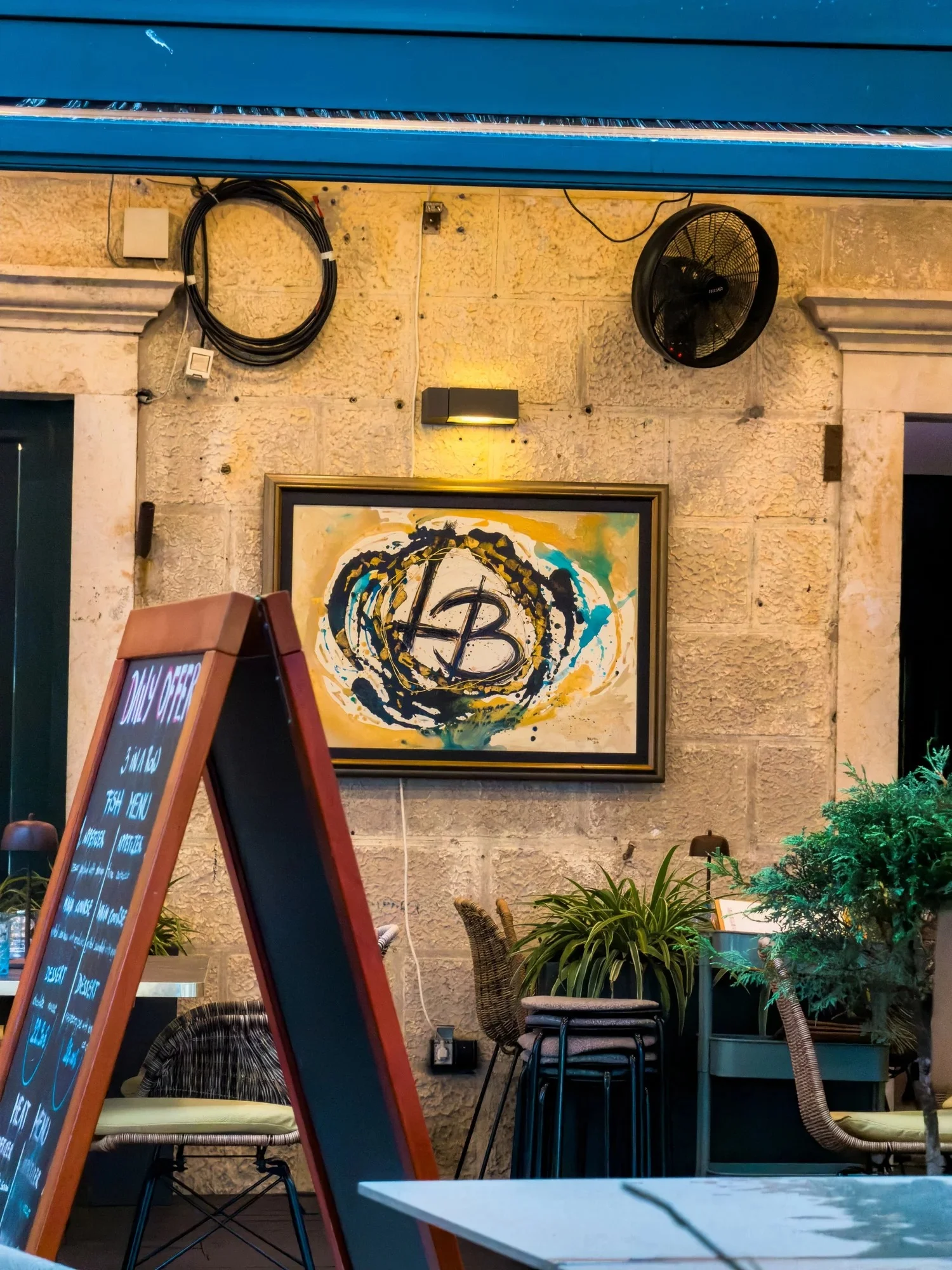 La Bohème monogram and menu board outside the restaurant in Cavtat