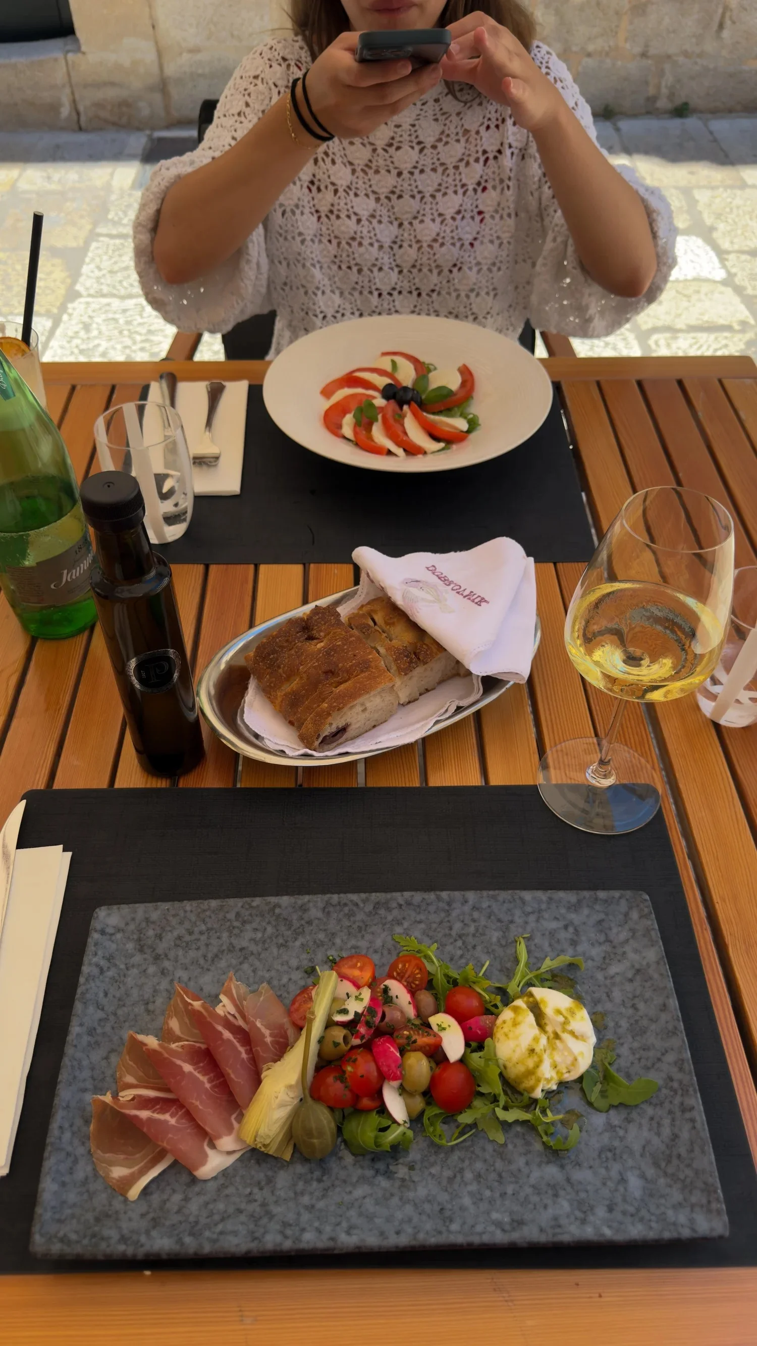Dalmatian prosciutto and burrata served at Fish Restaurant Proto
