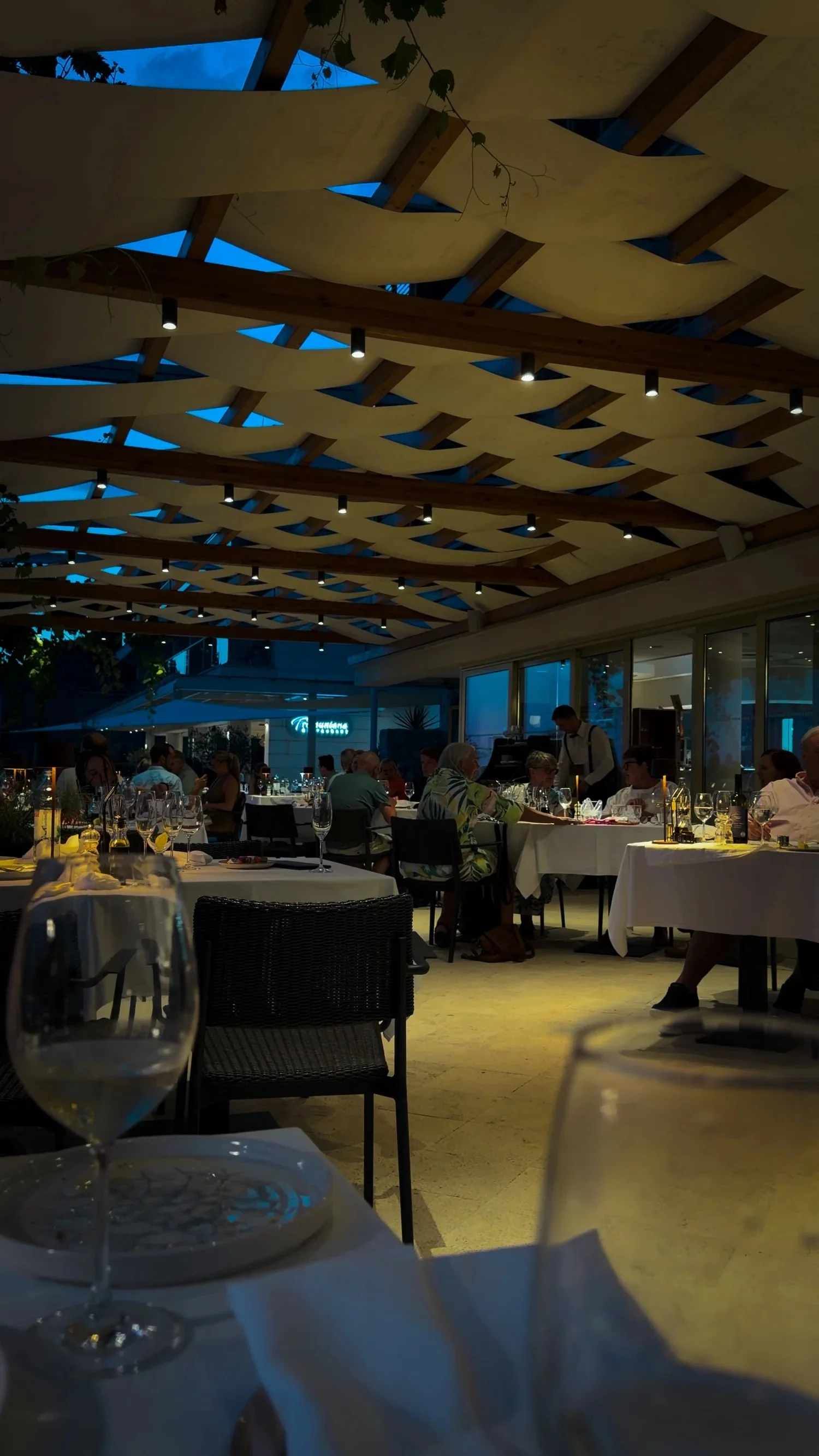 Restaurant More dining room with decorative fish suspended overhead